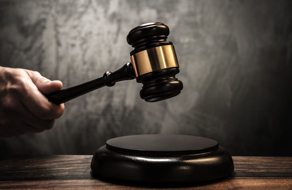 judge's holding wooden hammer